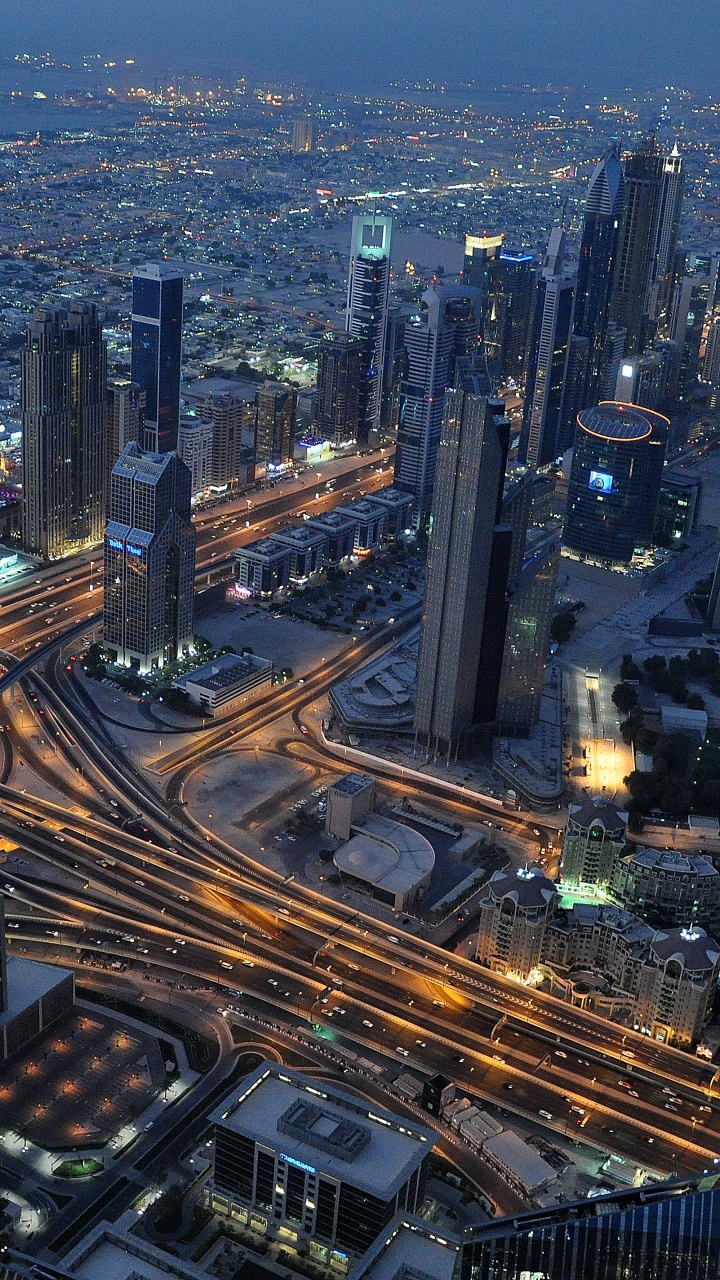 Aerial View of City Buildings During Night Time. Wallpaper in 720x1280 Resolution