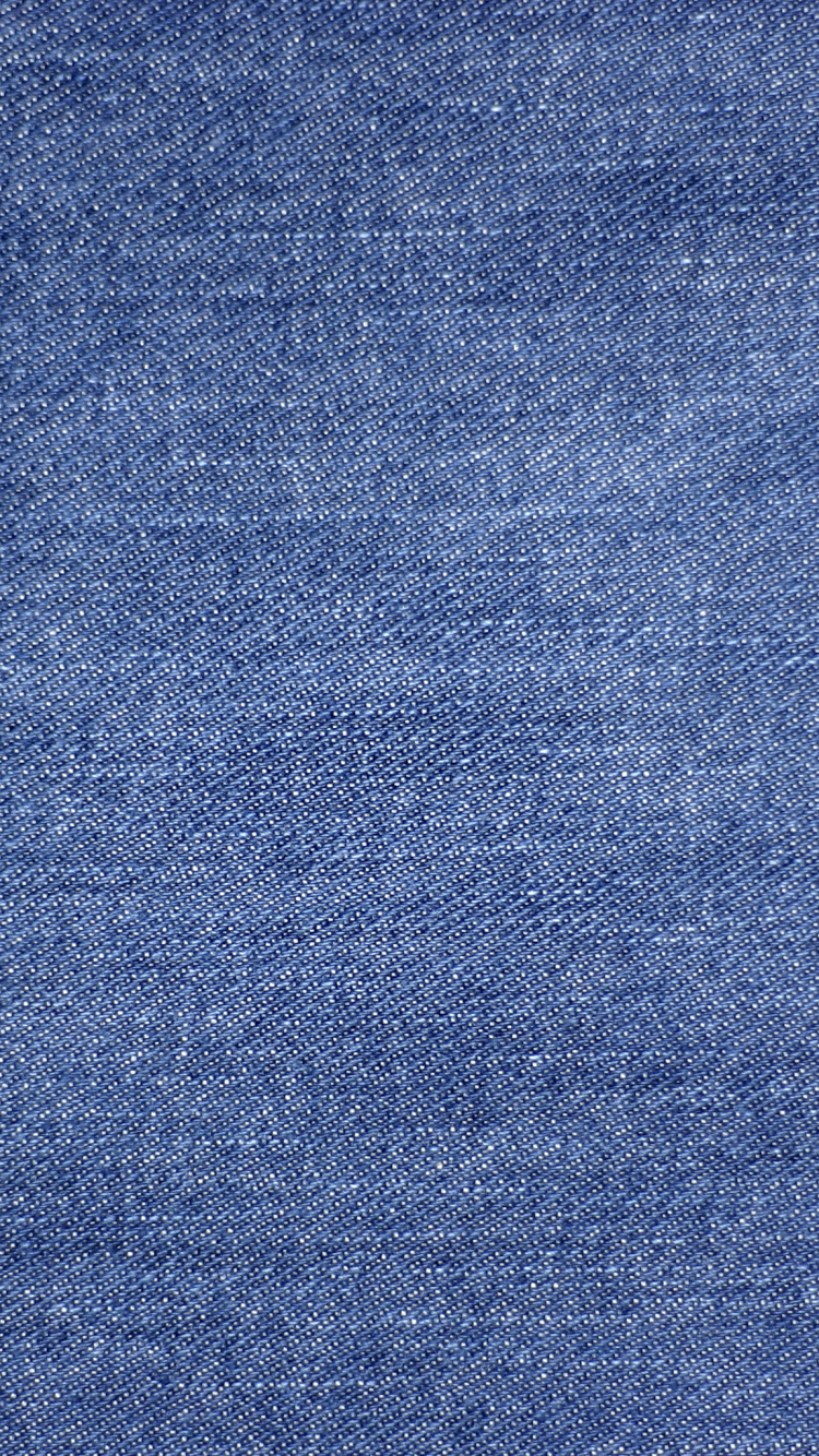 Blue Textile on Brown Wooden Table. Wallpaper in 750x1334 Resolution