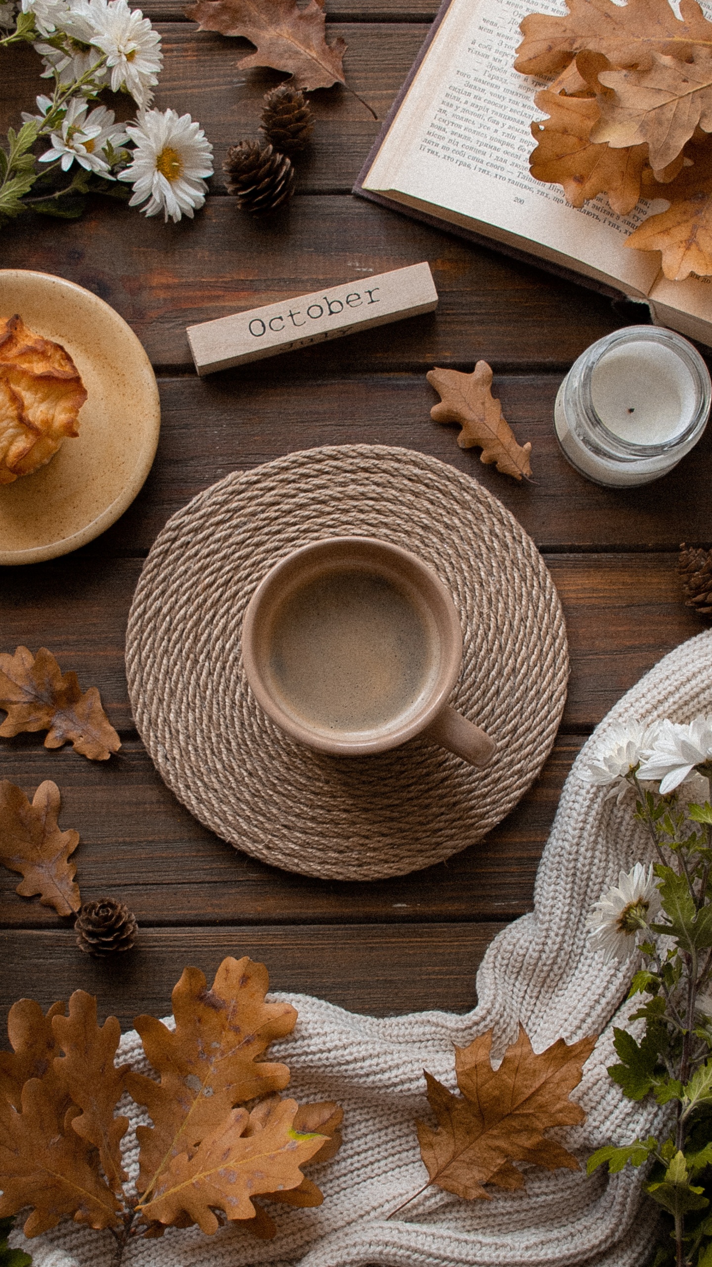Brown Dried Leaves on Brown Wooden Table. Wallpaper in 1440x2560 Resolution