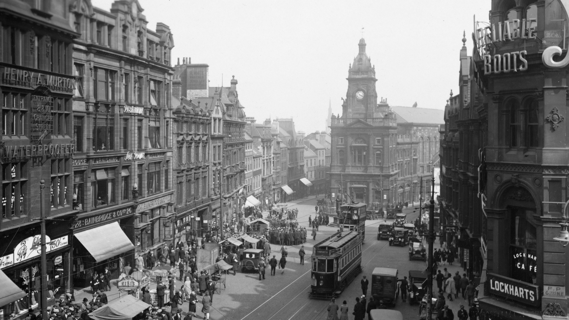 Grayscale Photo of People Walking on Street Near Buildings. Wallpaper in 1920x1080 Resolution