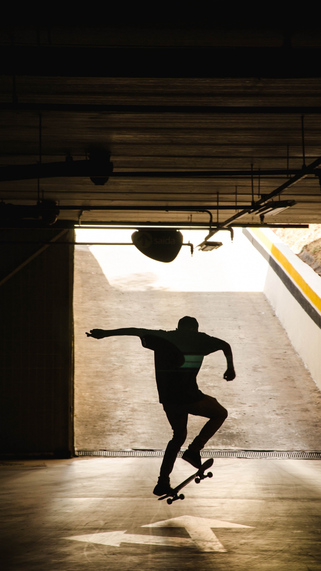 Man in Black Shirt and Black Pants Jumping on Air. Wallpaper in 1080x1920 Resolution