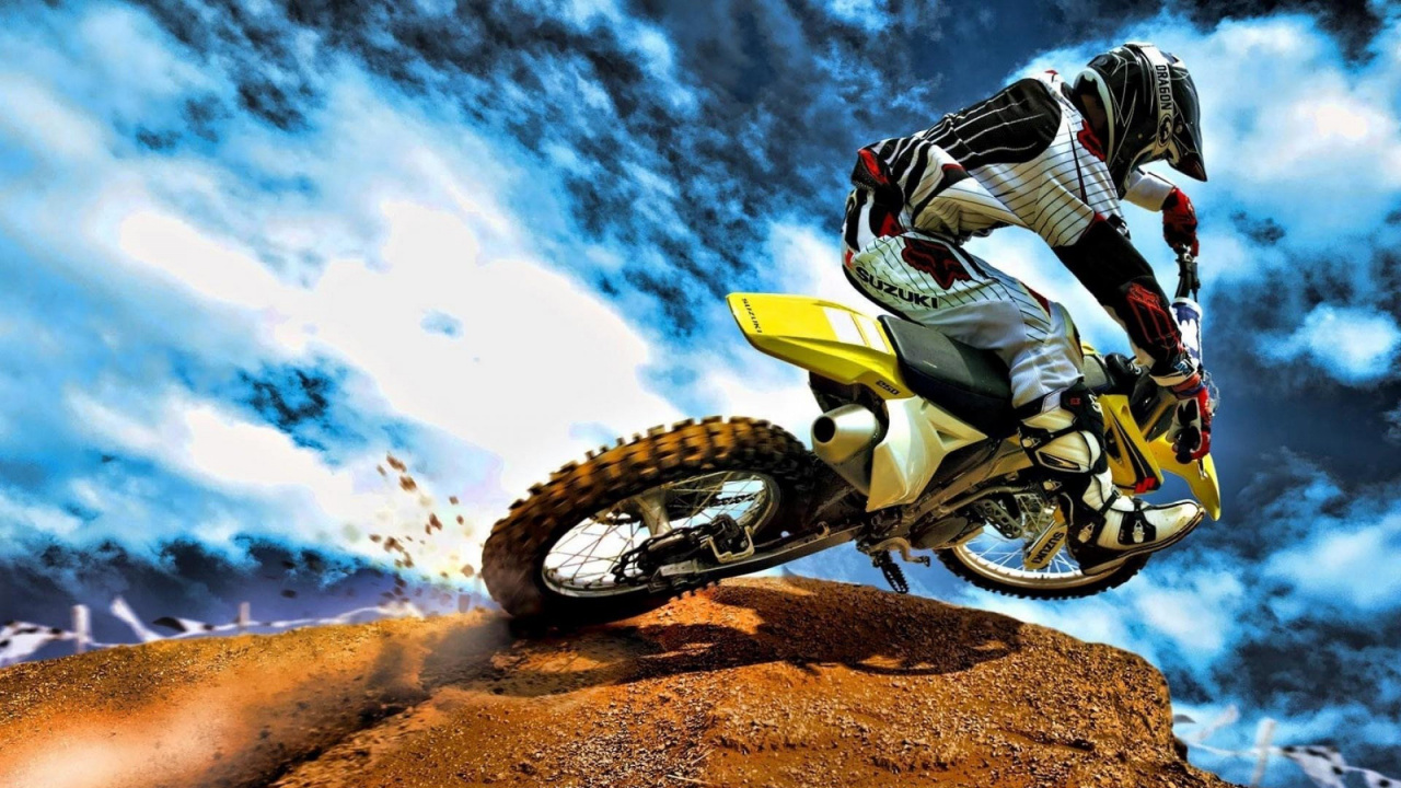 Man Riding Motocross Dirt Bike. Wallpaper in 1280x720 Resolution