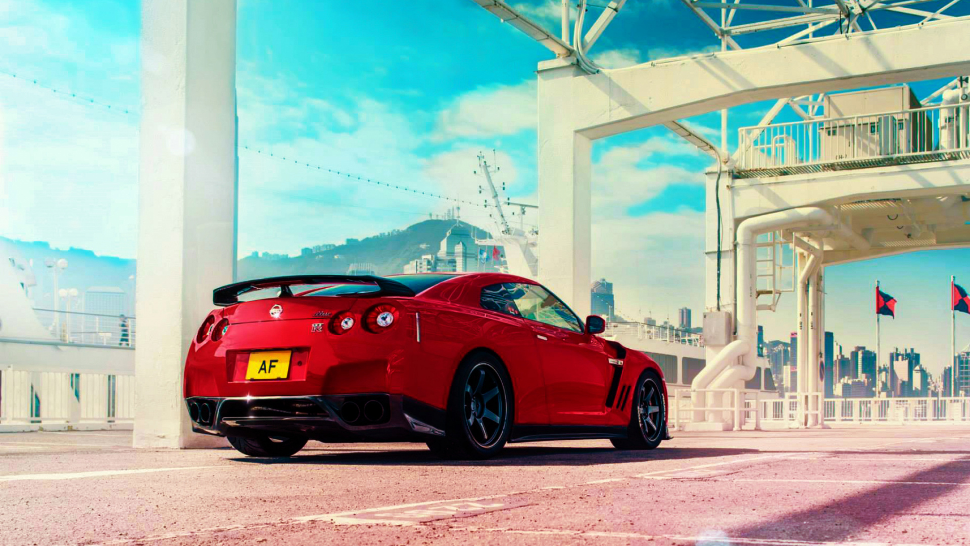 Red Ferrari 458 Italia Parked Near White Building. Wallpaper in 1920x1080 Resolution