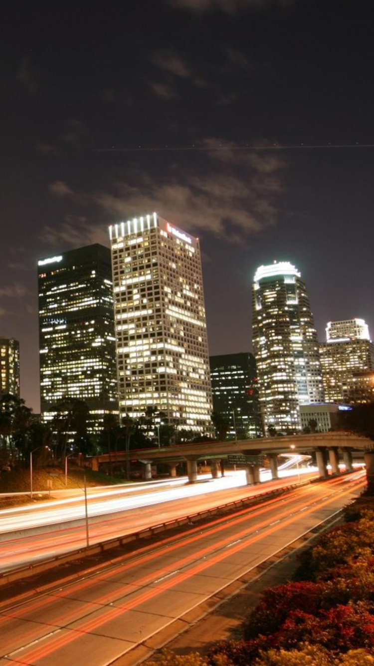 City Buildings During Night Time. Wallpaper in 750x1334 Resolution