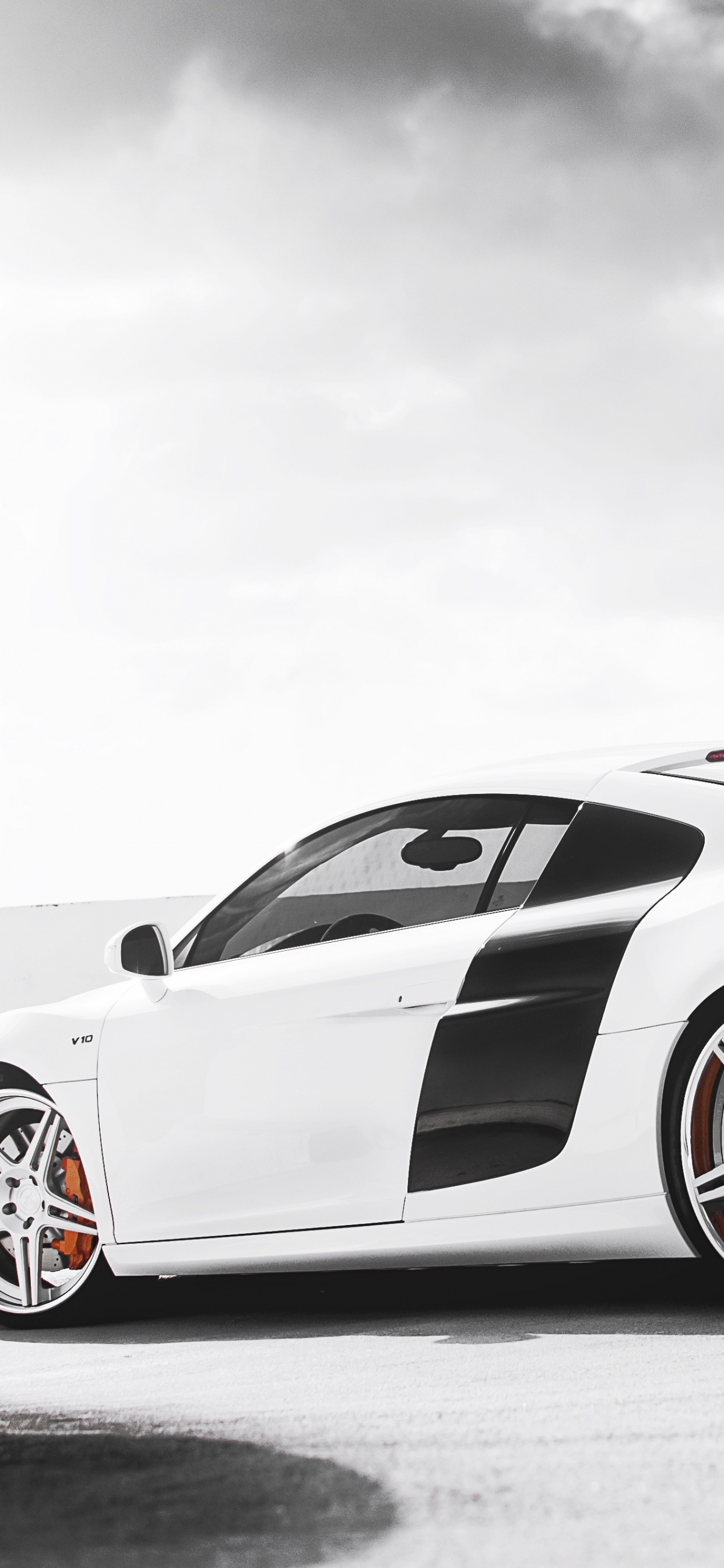 White Porsche 911 on Black Surface. Wallpaper in 1242x2688 Resolution