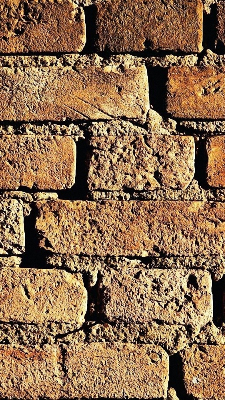 Braune Und Weiße Mauer. Wallpaper in 720x1280 Resolution