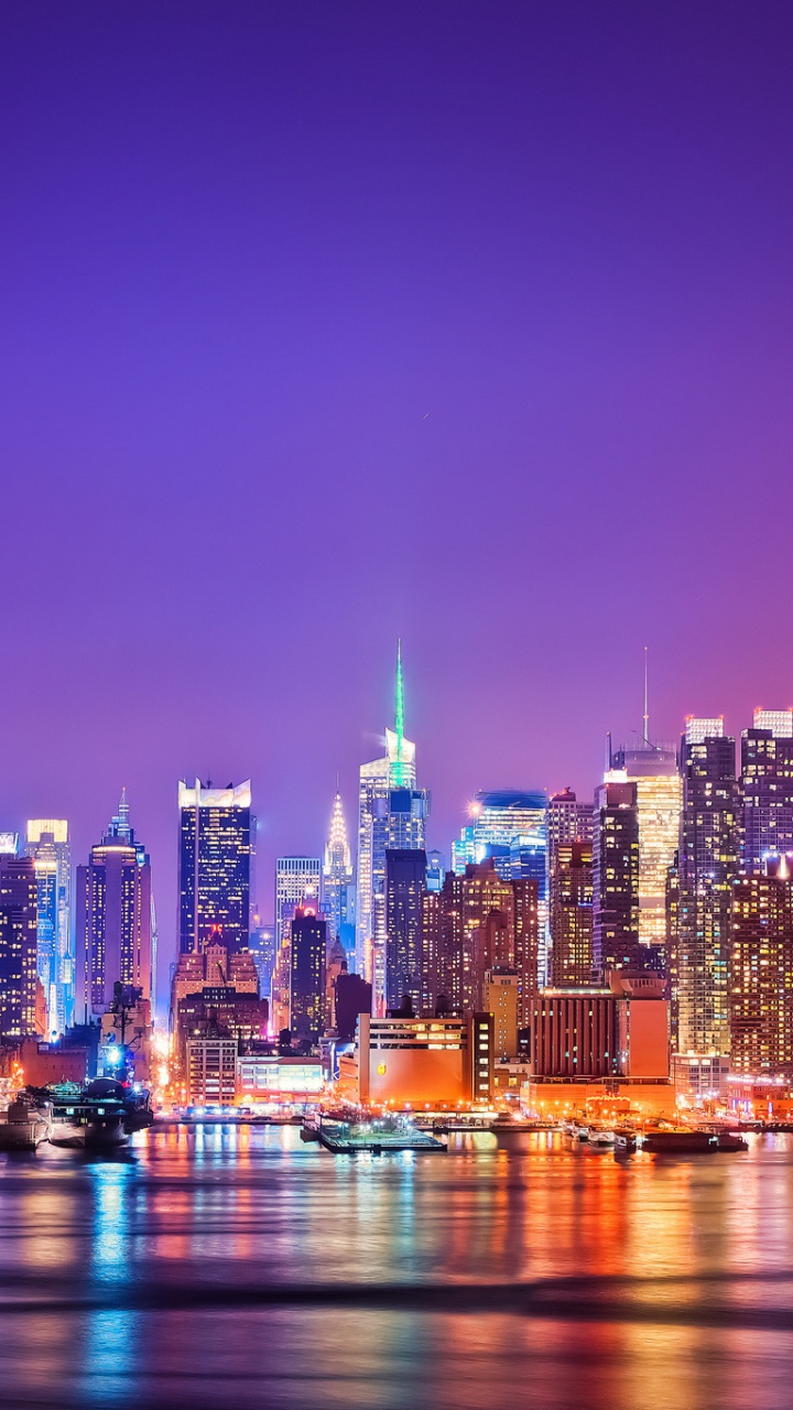 City Skyline During Night Time. Wallpaper in 720x1280 Resolution