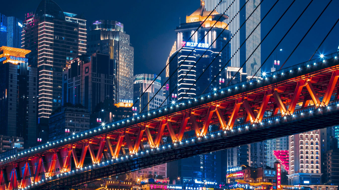 Lighted Bridge Over Water During Night Time. Wallpaper in 1366x768 Resolution