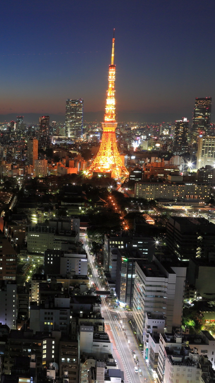 Eiffel Tower in Paris During Night Time. Wallpaper in 750x1334 Resolution