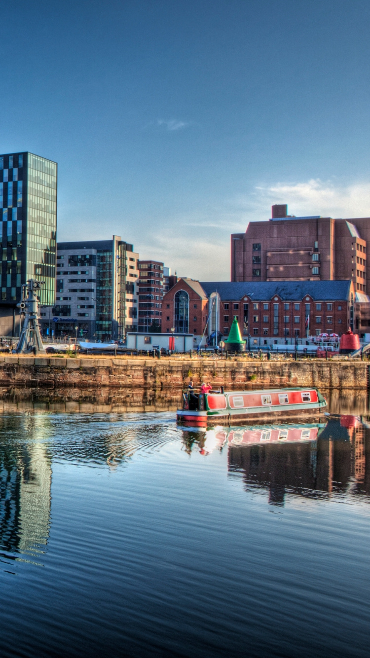 Body of Water Near City Buildings During Daytime. Wallpaper in 750x1334 Resolution