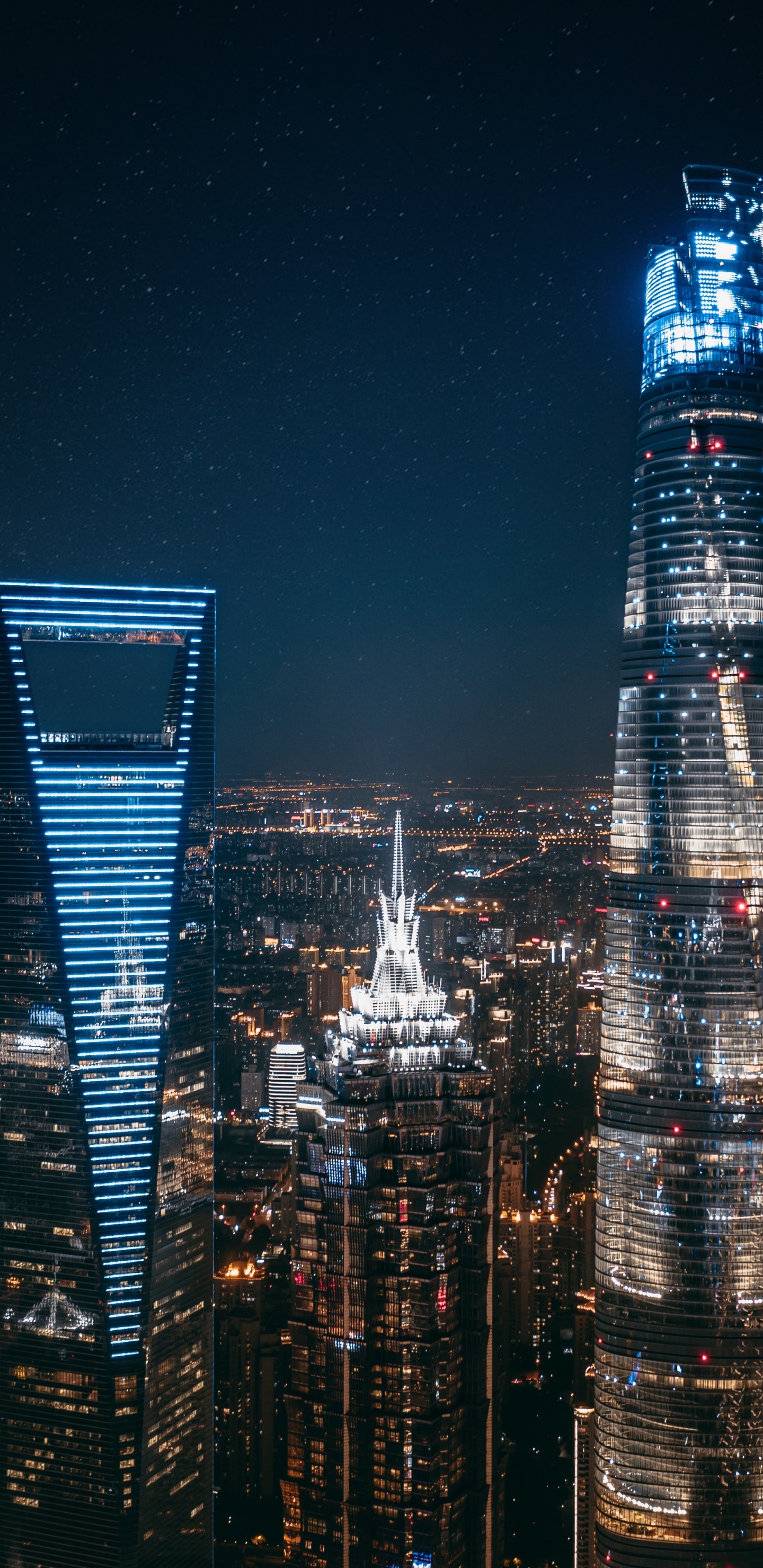 City Skyline During Night Time. Wallpaper in 1440x2960 Resolution
