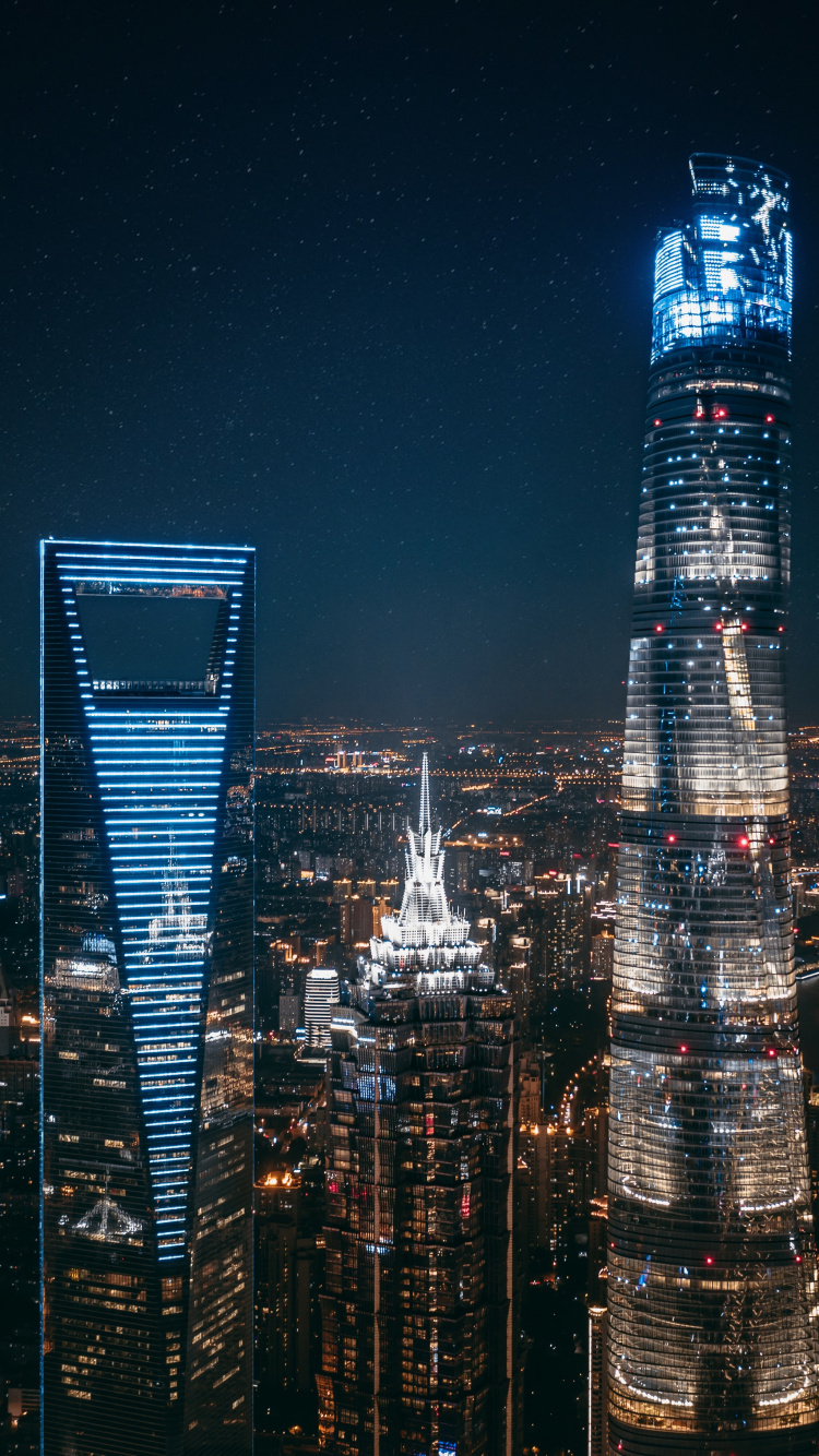 Horizonte de la Ciudad Durante la Noche. Wallpaper in 750x1334 Resolution