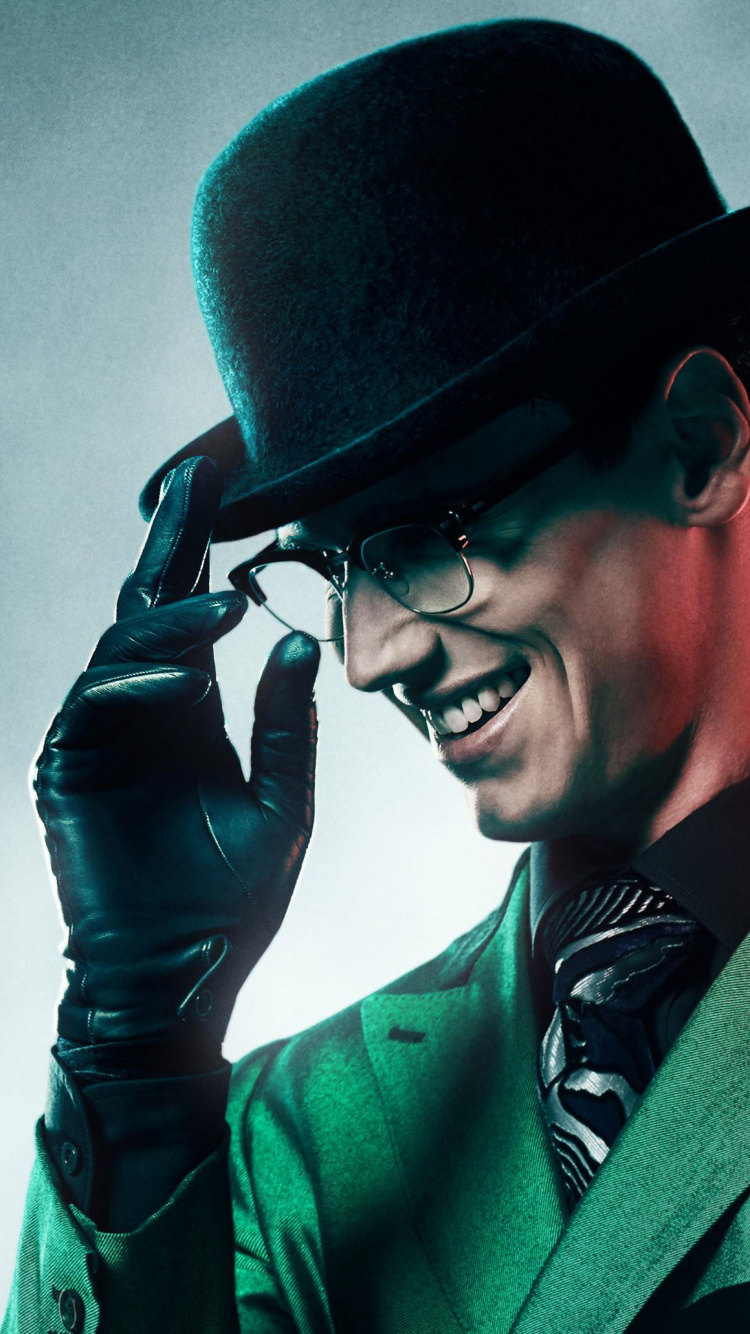 Homme au Chapeau Noir et Veste de Costume Verte. Wallpaper in 750x1334 Resolution