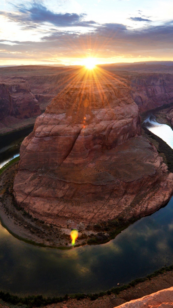 Brown Rock Formation on Body of Water During Daytime. Wallpaper in 720x1280 Resolution