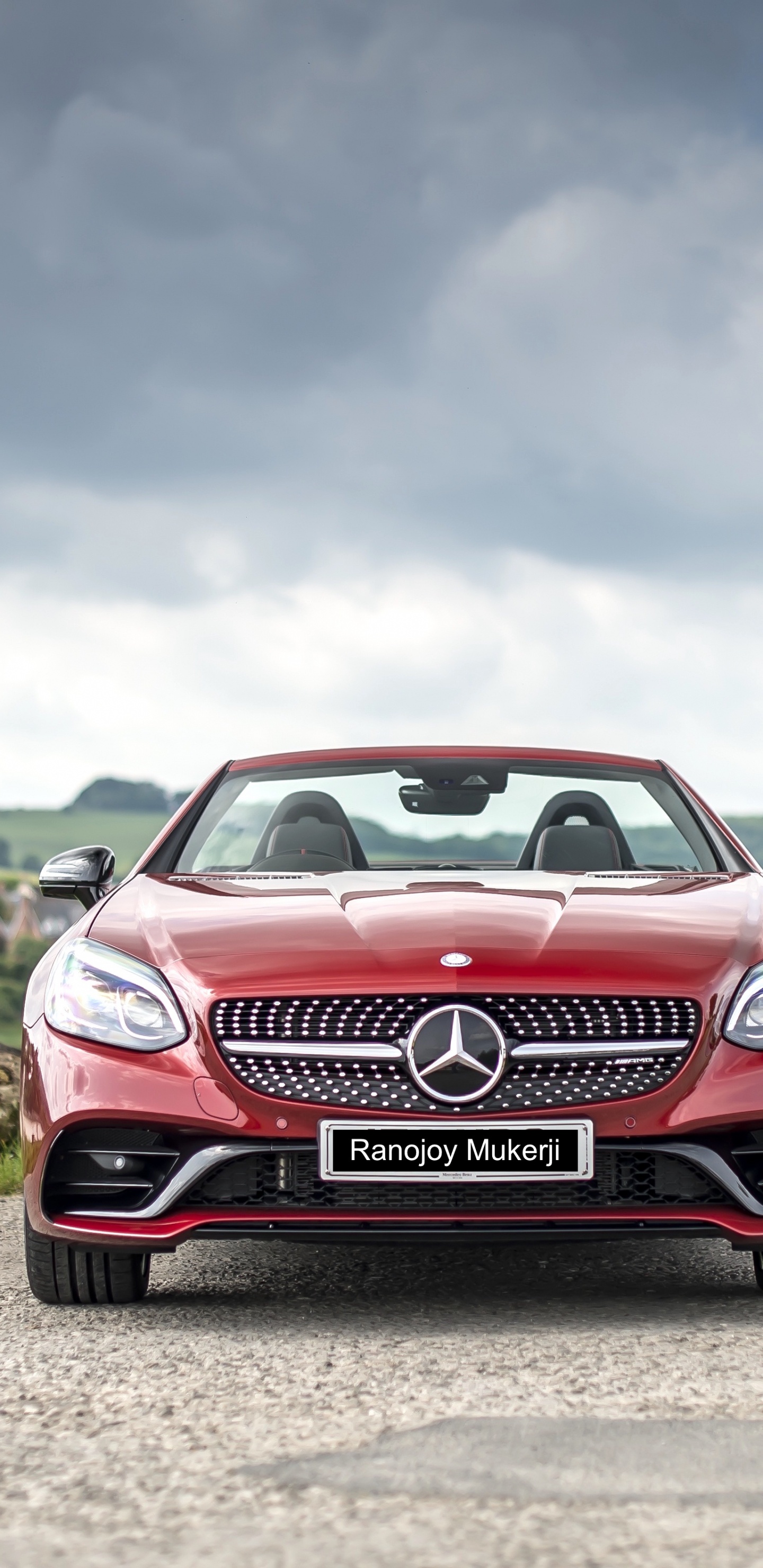 Red and White Bmw m 3 on Green Grass Field Under White Clouds and Blue Sky. Wallpaper in 1440x2960 Resolution