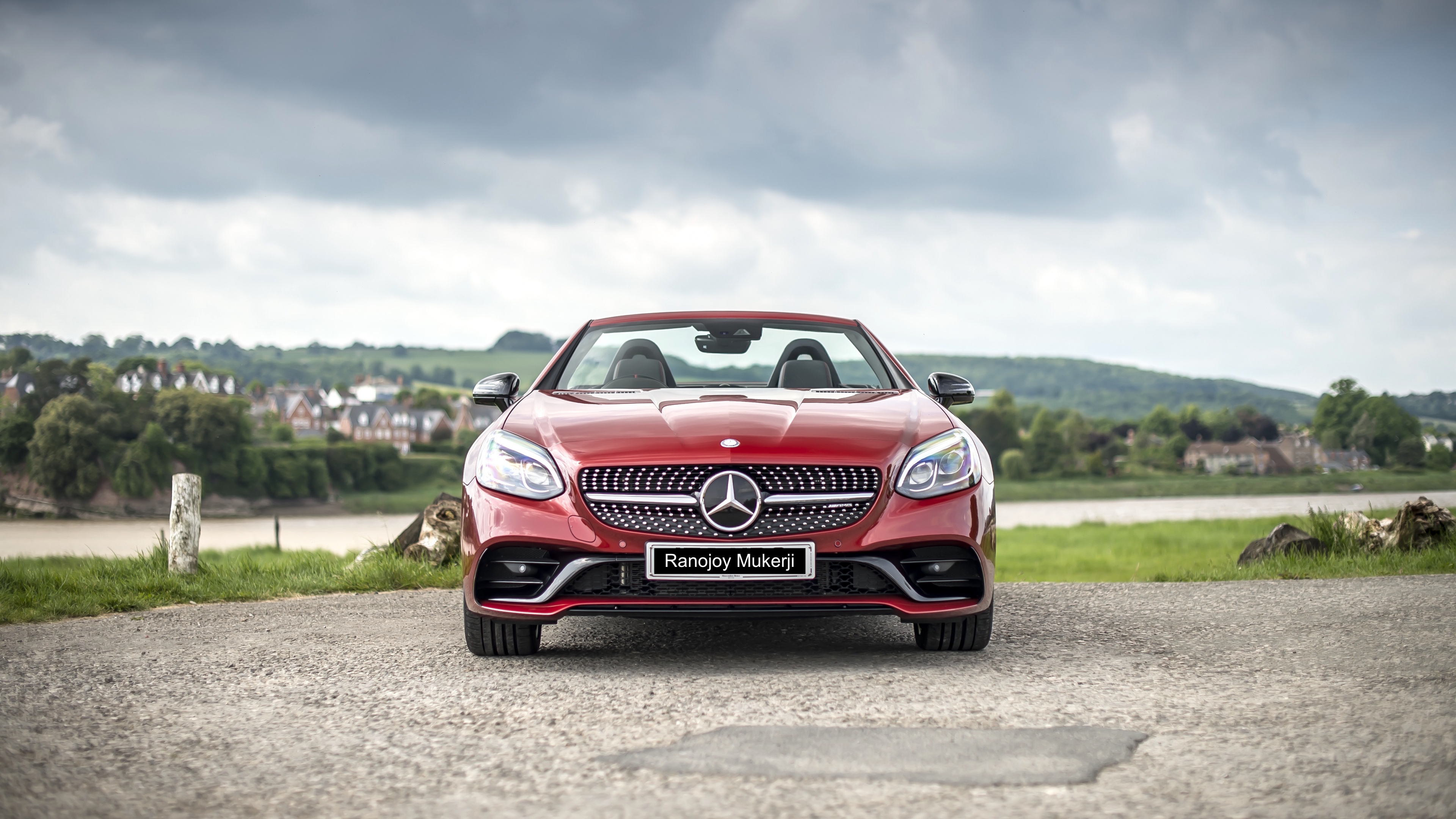 Red and White Bmw m 3 on Green Grass Field Under White Clouds and Blue Sky. Wallpaper in 3840x2160 Resolution