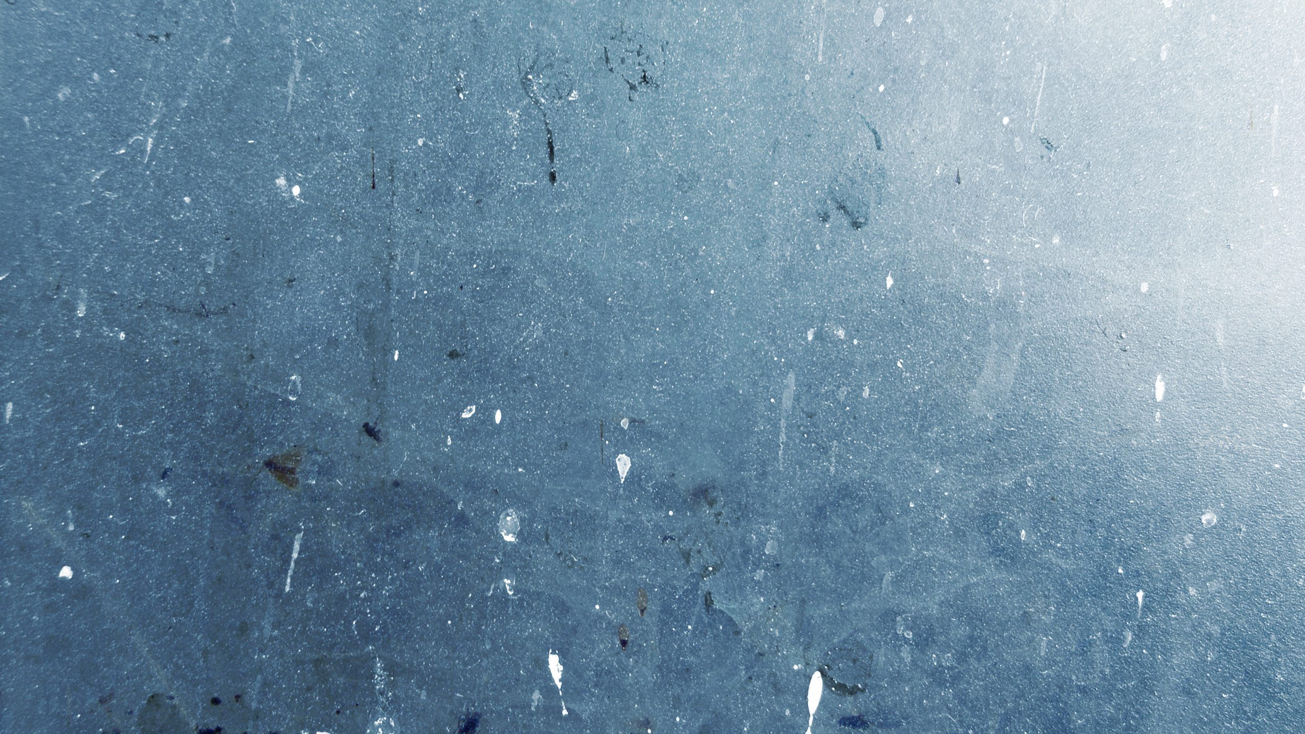 Person in Black Pants Walking on Gray Concrete Floor. Wallpaper in 2560x1440 Resolution