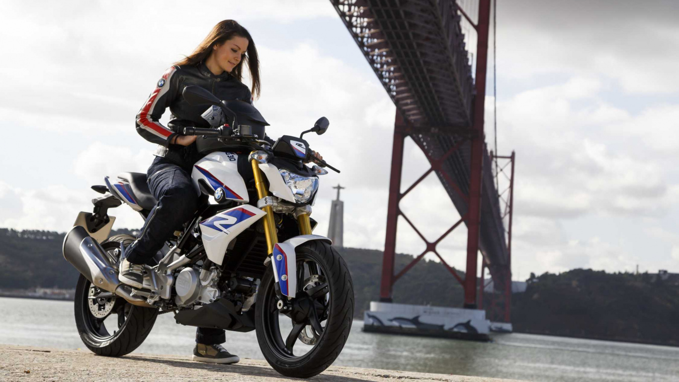 Woman in Black Jacket Riding Yellow and Black Motorcycle. Wallpaper in 1366x768 Resolution