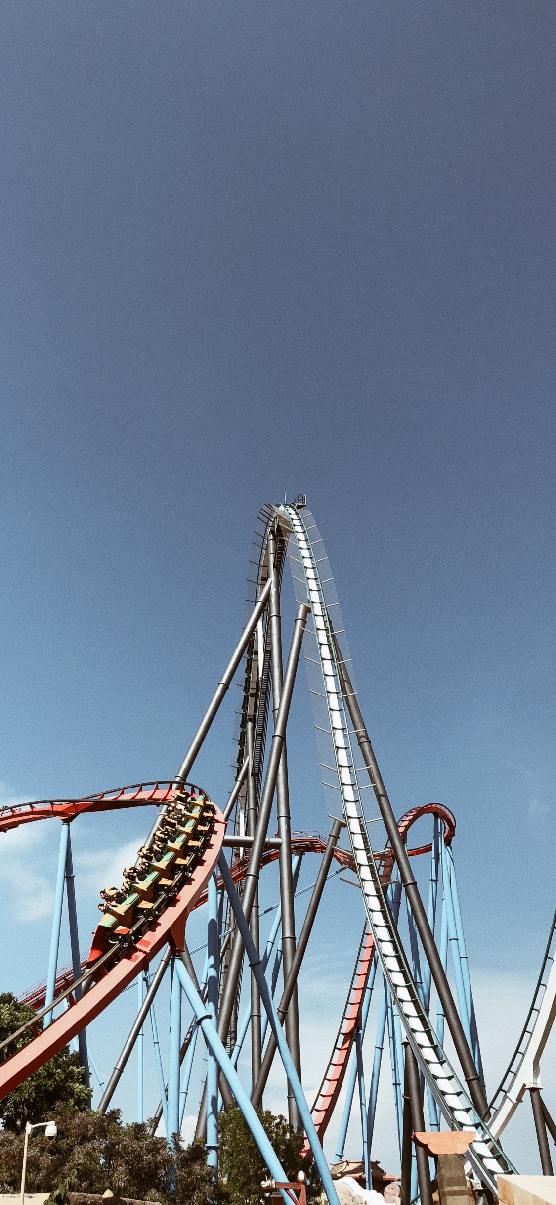 Roller Coaster, Tourist Attraction, Nature, Blue, Daytime. Wallpaper in 1125x2436 Resolution