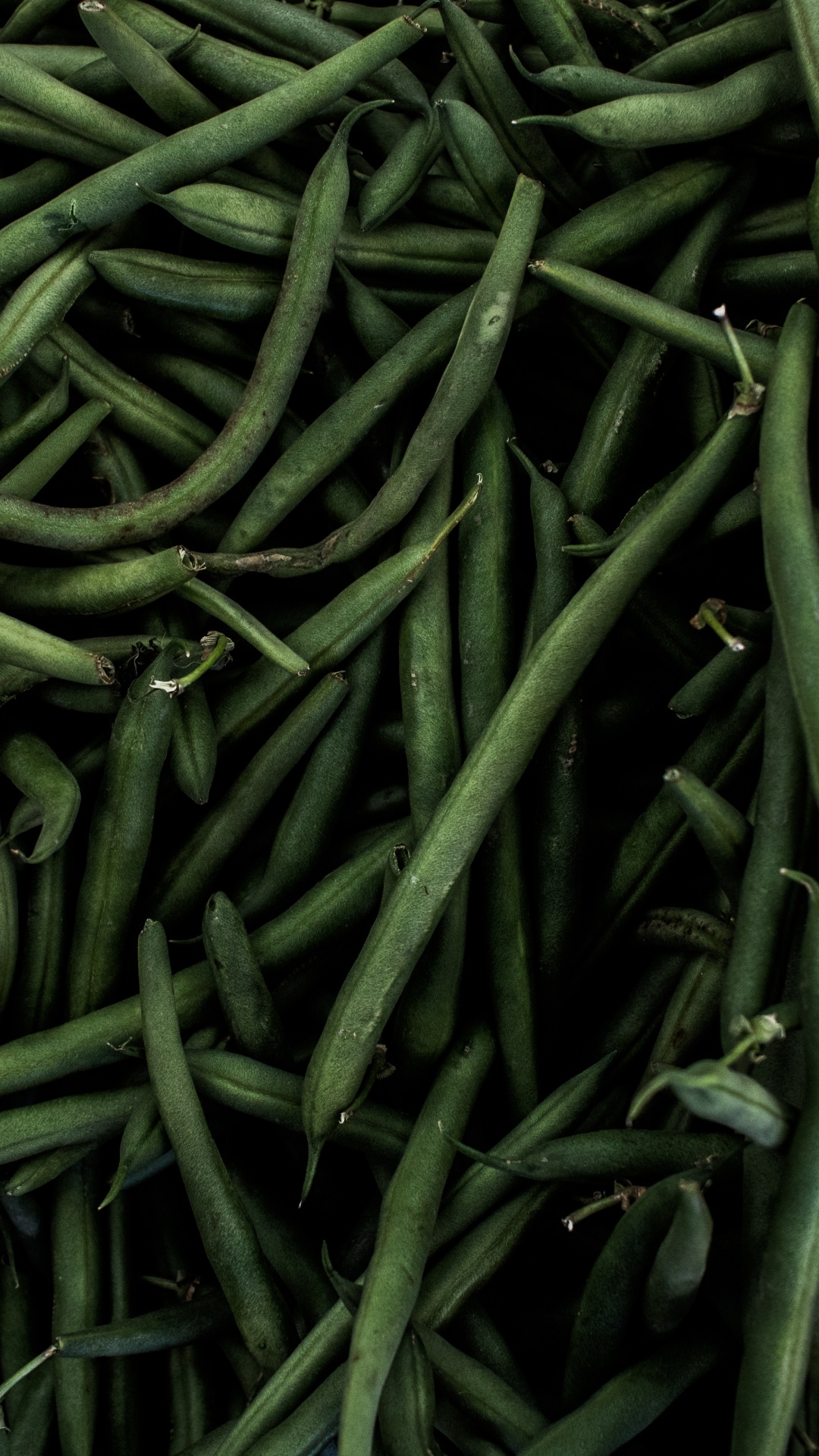 Green Chili Lot on Blue Textile. Wallpaper in 1080x1920 Resolution