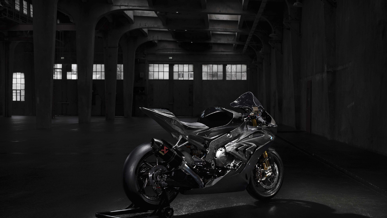 Black and White Sports Bike Parked on Gray Concrete Floor. Wallpaper in 1280x720 Resolution