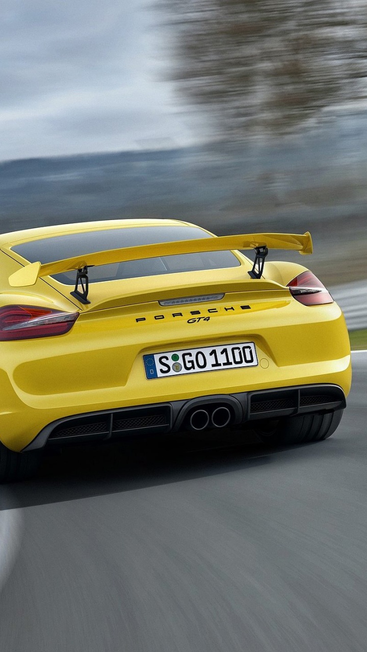 Porsche 911 Amarillo en la Carretera. Wallpaper in 720x1280 Resolution