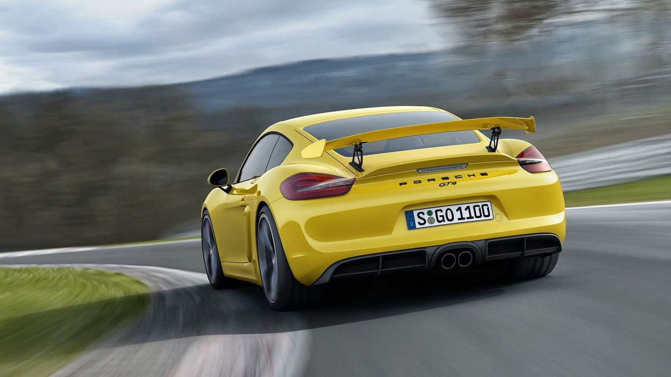 Gelber Porsche 911 Unterwegs. Wallpaper in 1366x768 Resolution