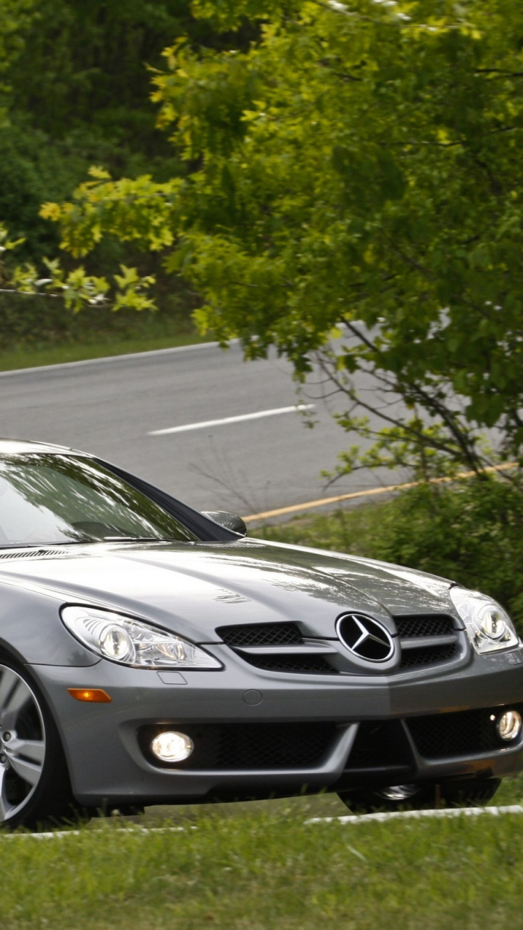 Black Porsche 911 on Road During Daytime. Wallpaper in 750x1334 Resolution