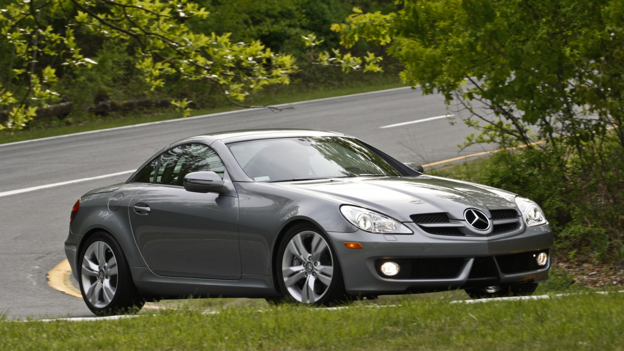 Porsche 911 Noire Sur Route Pendant la Journée. Wallpaper in 1280x720 Resolution