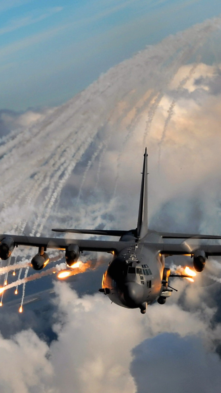 Black Airplane on Mid Air During Daytime. Wallpaper in 750x1334 Resolution