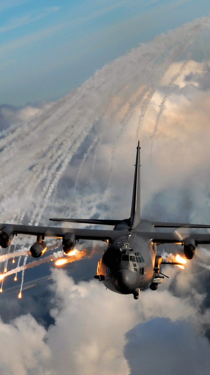 Avión Negro en el Aire Durante el Día. Wallpaper in 720x1280 Resolution