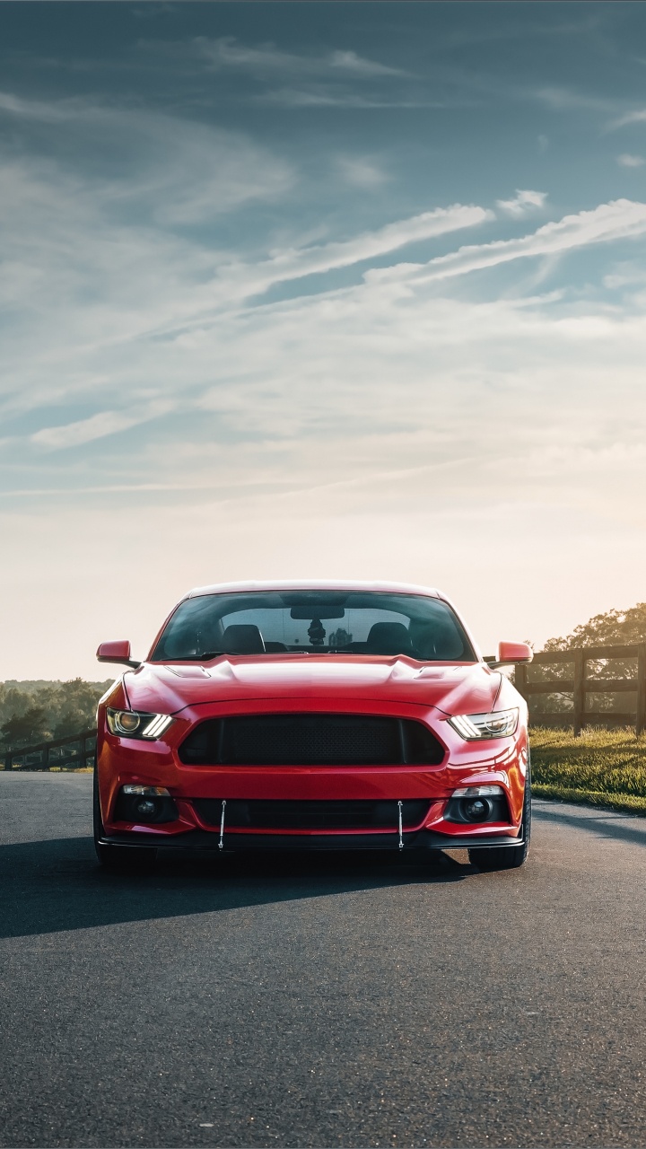 Red Car on The Road During Daytime. Wallpaper in 720x1280 Resolution