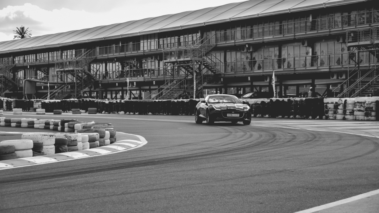 Grayscale Photo of Cars on Road. Wallpaper in 1280x720 Resolution