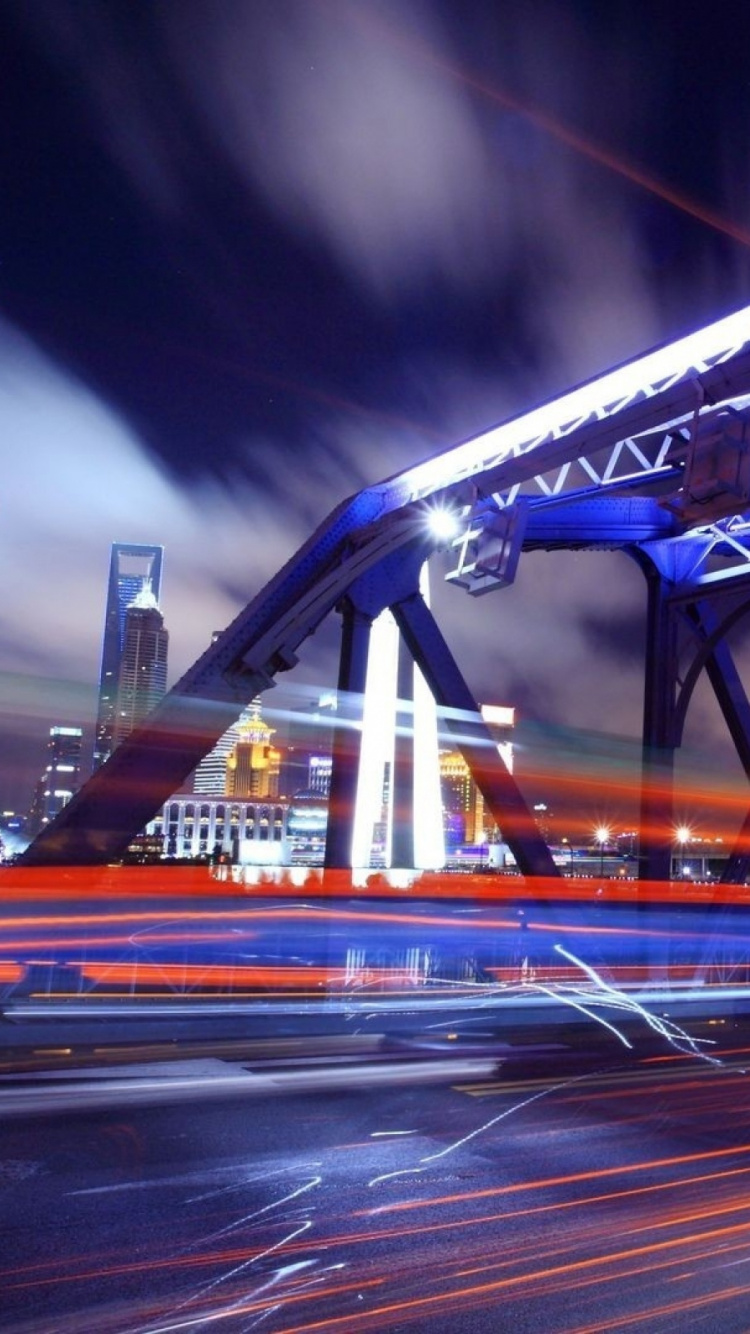Time Lapse Photography of Cars on Bridge During Night Time. Wallpaper in 750x1334 Resolution