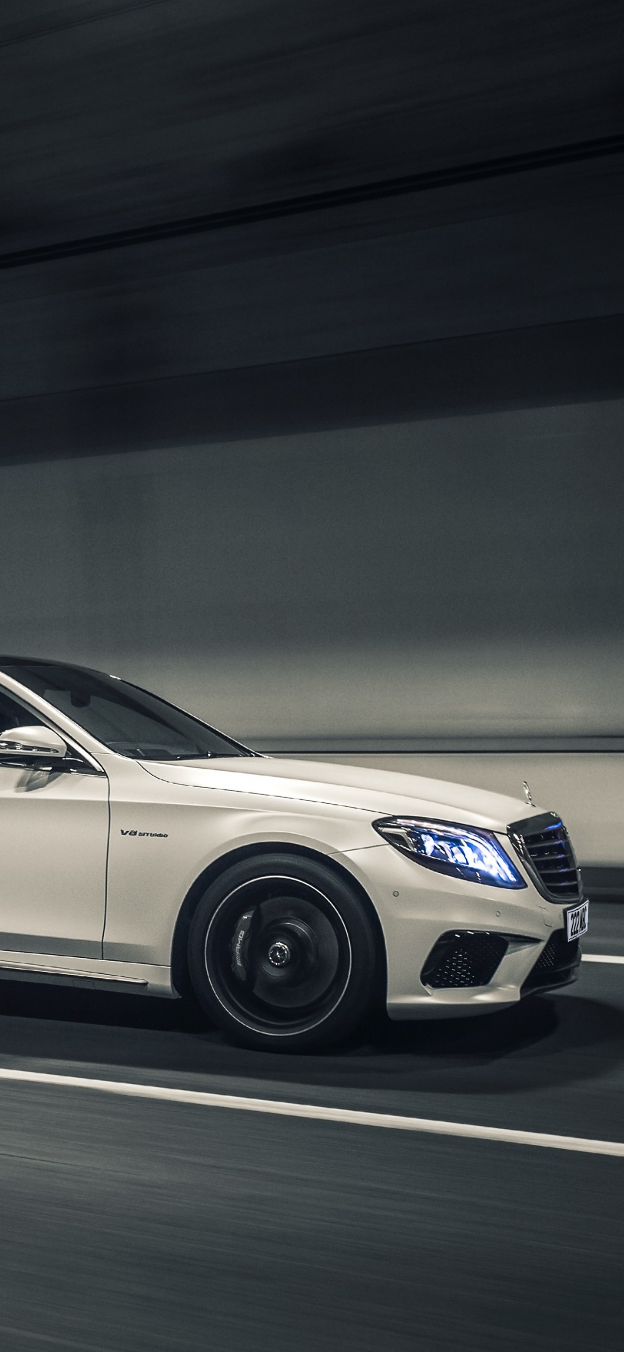 White Mercedes Benz Coupe on Road. Wallpaper in 1242x2688 Resolution