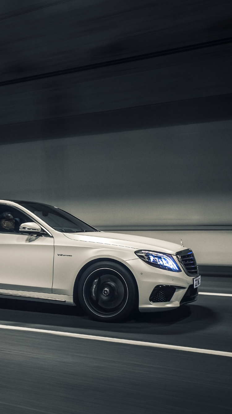 White Mercedes Benz Coupe on Road. Wallpaper in 750x1334 Resolution