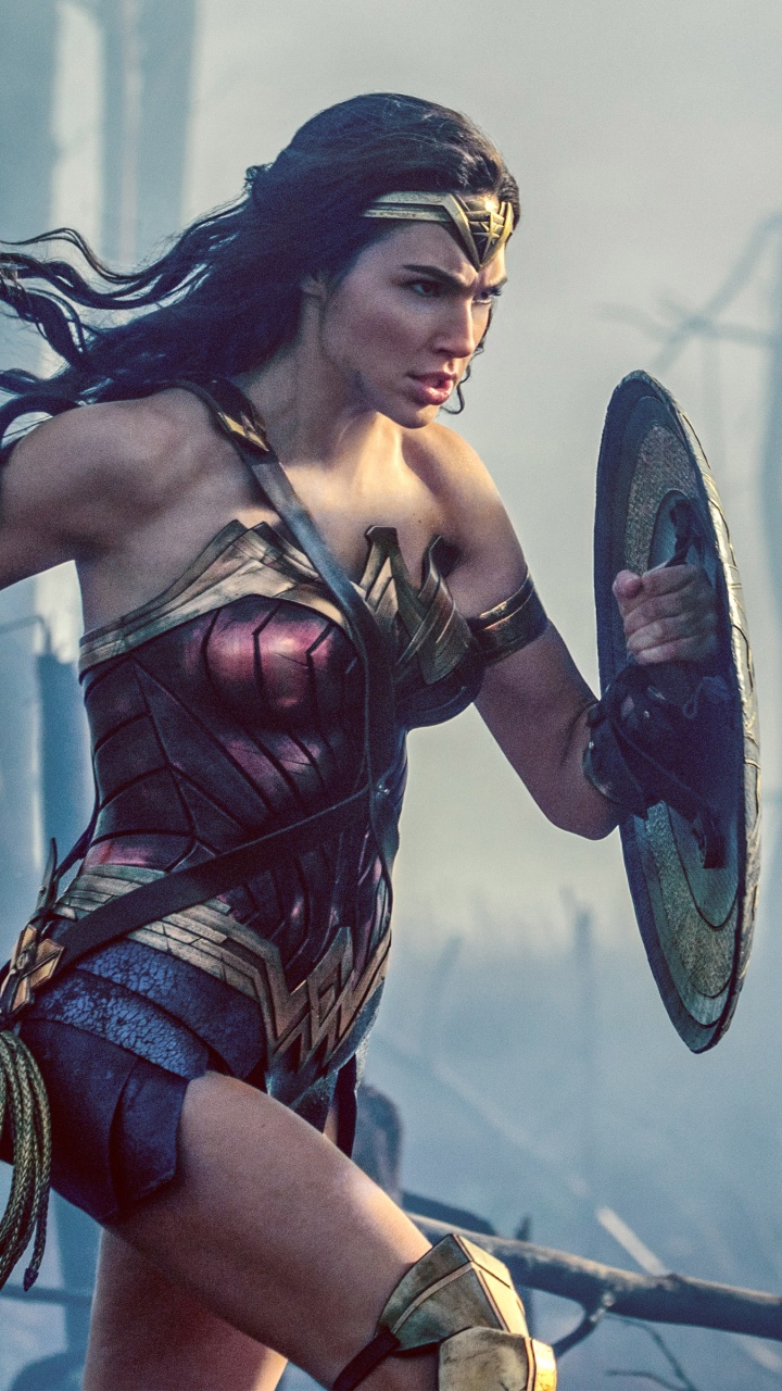 Woman in Black and Red Bikini Holding Black and White Basketball. Wallpaper in 720x1280 Resolution