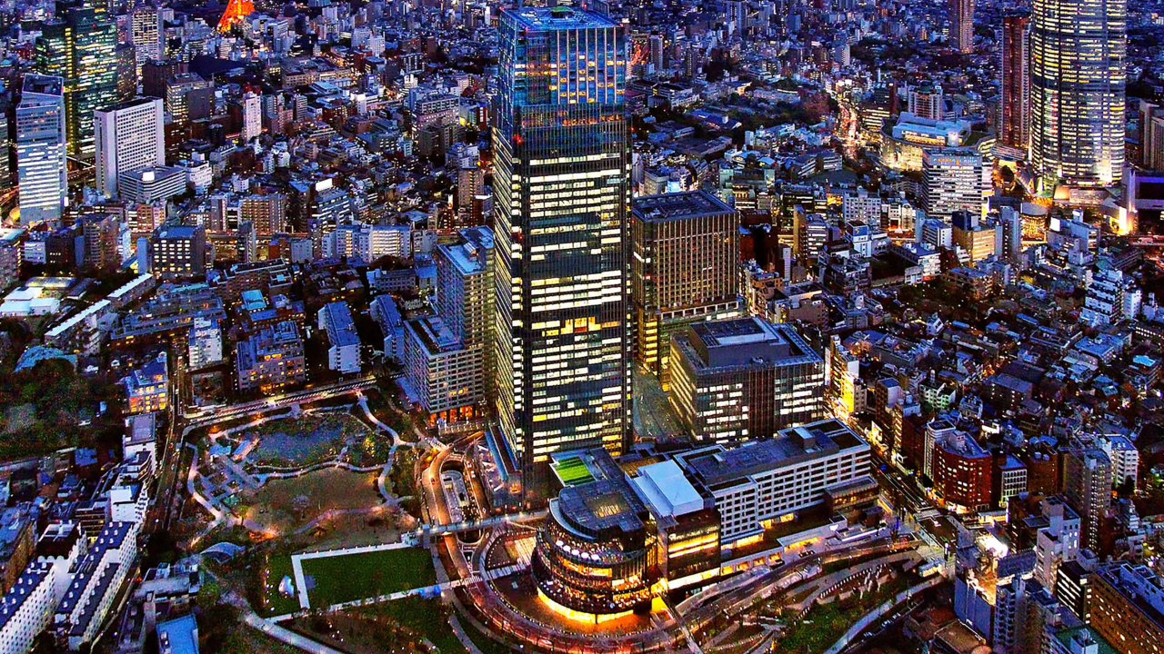 Aerial View of City Buildings During Night Time. Wallpaper in 1280x720 Resolution