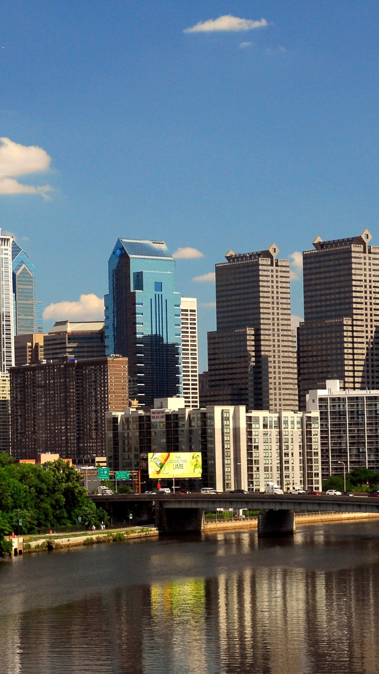 City Skyline Under Blue Sky During Daytime. Wallpaper in 750x1334 Resolution
