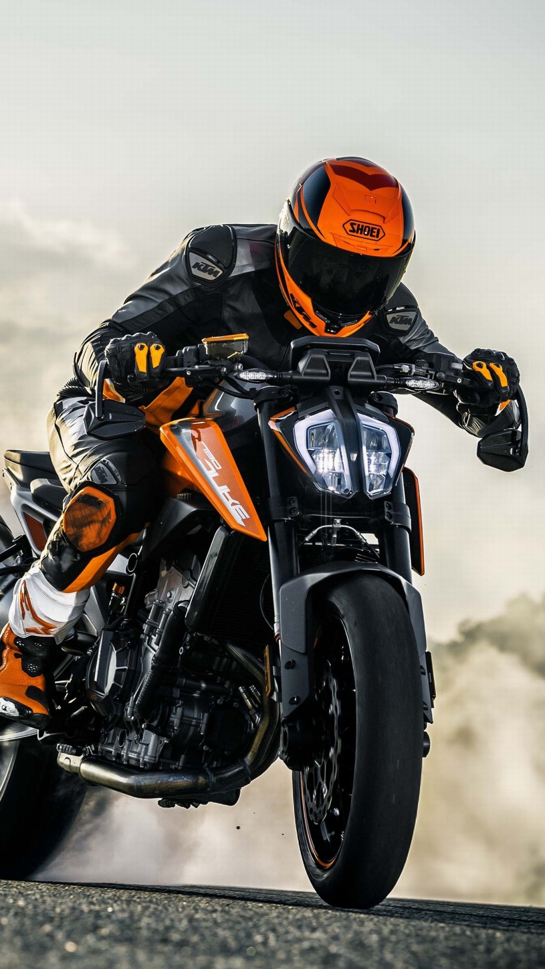 Man in Orange Helmet Riding Black Sports Bike. Wallpaper in 1080x1920 Resolution