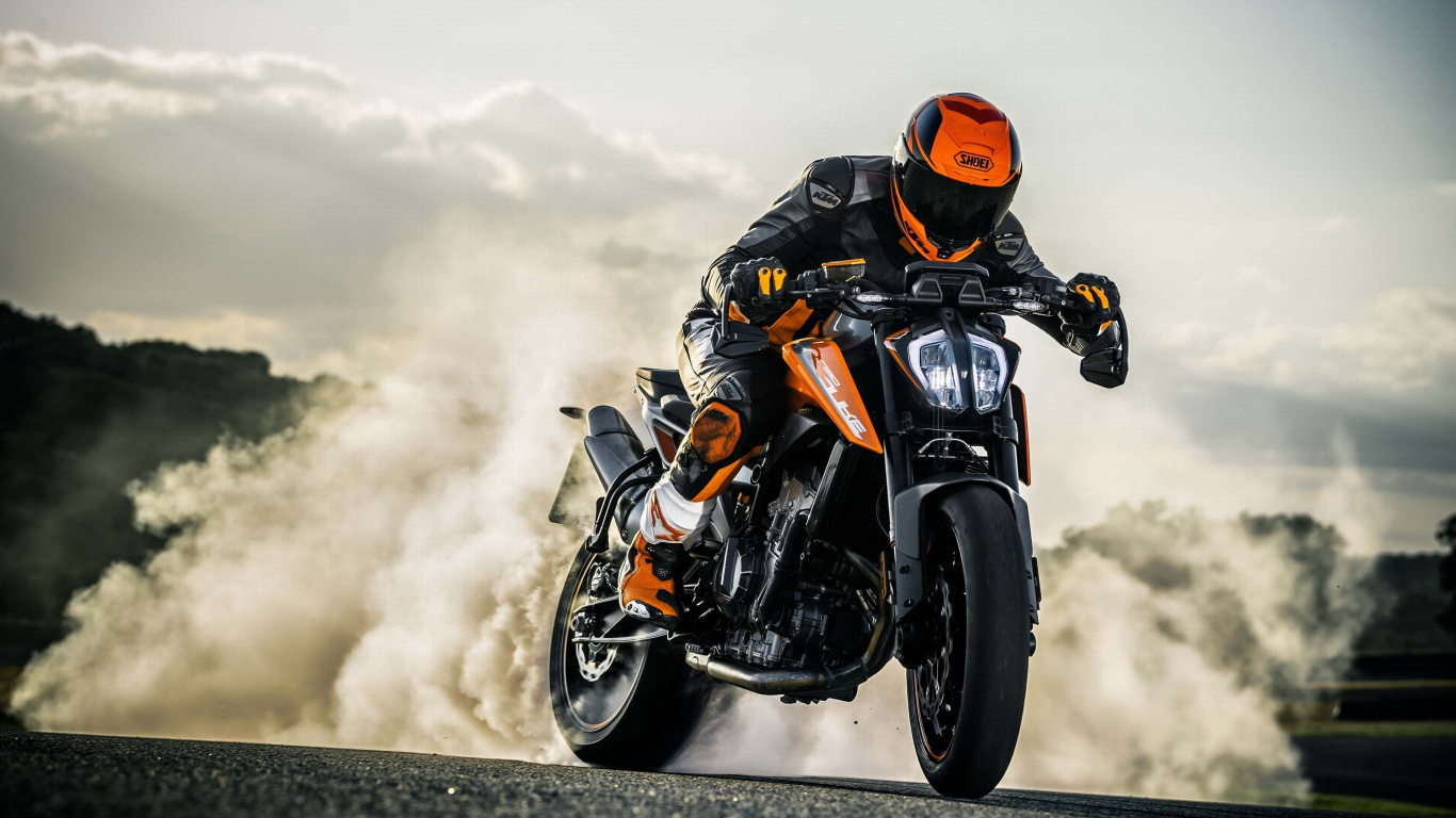 Man in Orange Helmet Riding Black Sports Bike. Wallpaper in 1366x768 Resolution