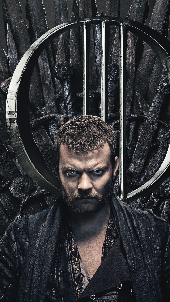 Man in Black Jacket Standing Near Black Metal Frame. Wallpaper in 720x1280 Resolution