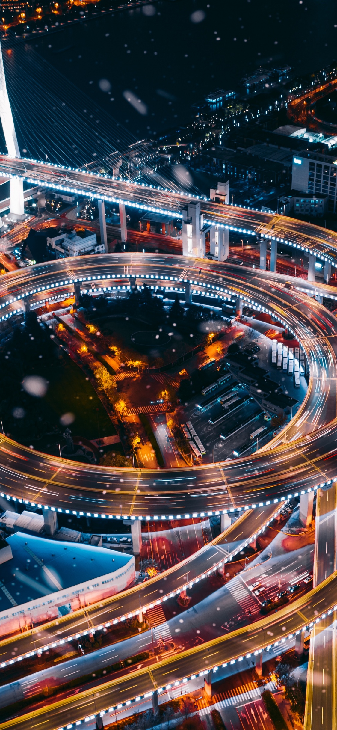 Time Lapse Photography of City Lights During Night Time. Wallpaper in 1125x2436 Resolution