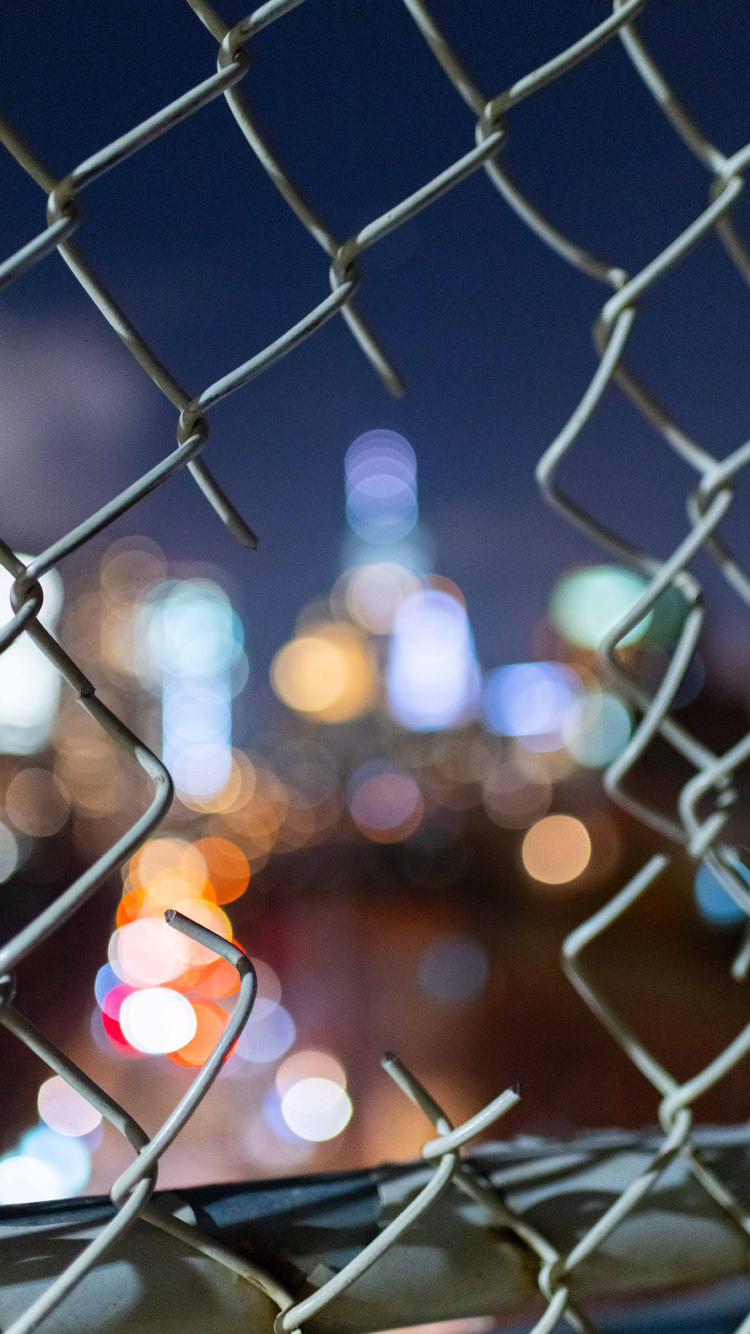 Bokeh Photography of Gray Metal Fence. Wallpaper in 750x1334 Resolution