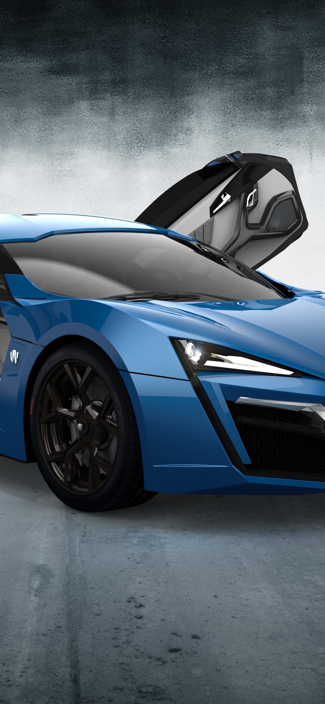 Lamborghini Aventador Bleue Dans Une Salle Blanche. Wallpaper in 1242x2688 Resolution