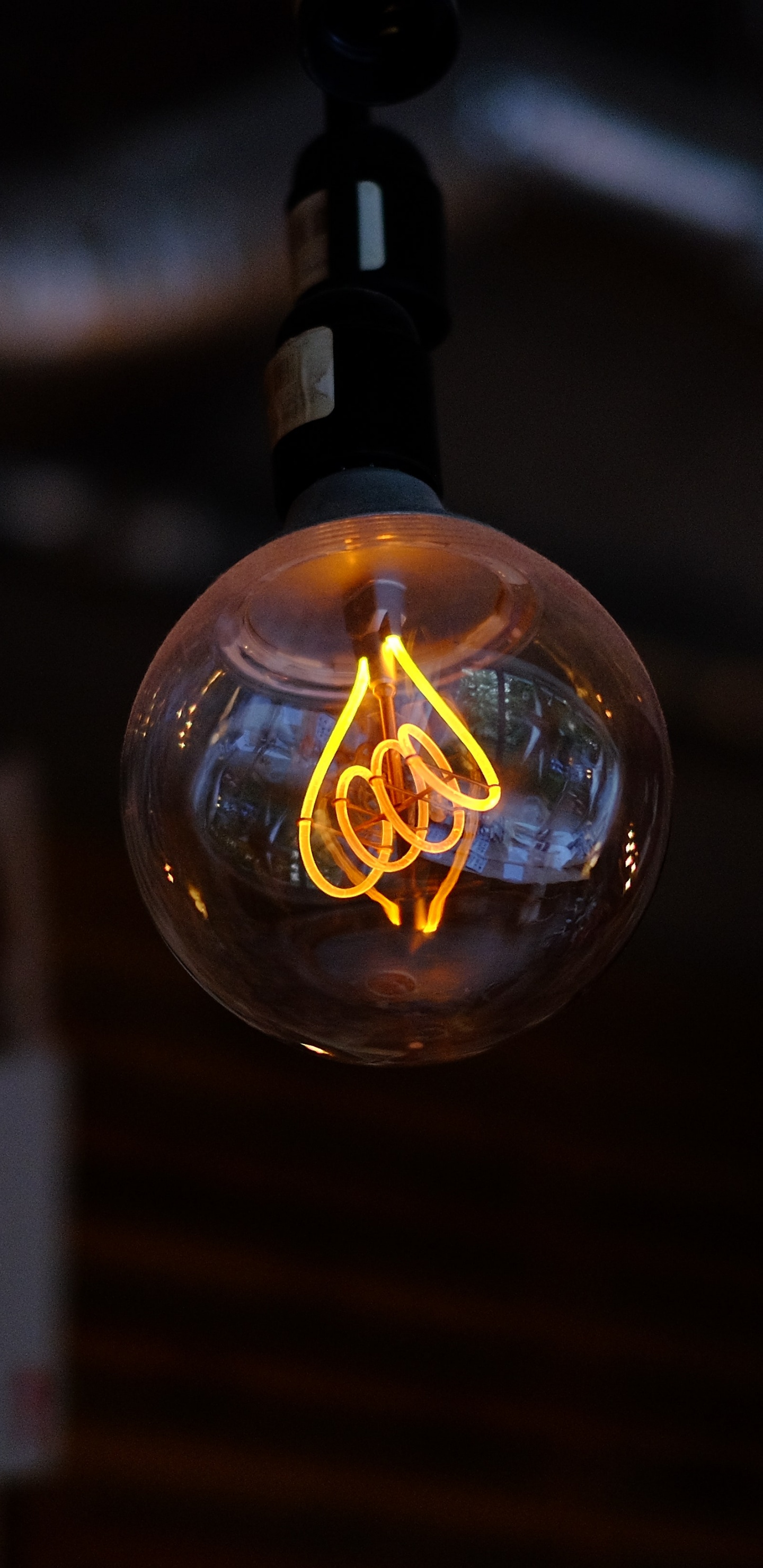 Clear Glass Bulb With Black Strap. Wallpaper in 1440x2960 Resolution