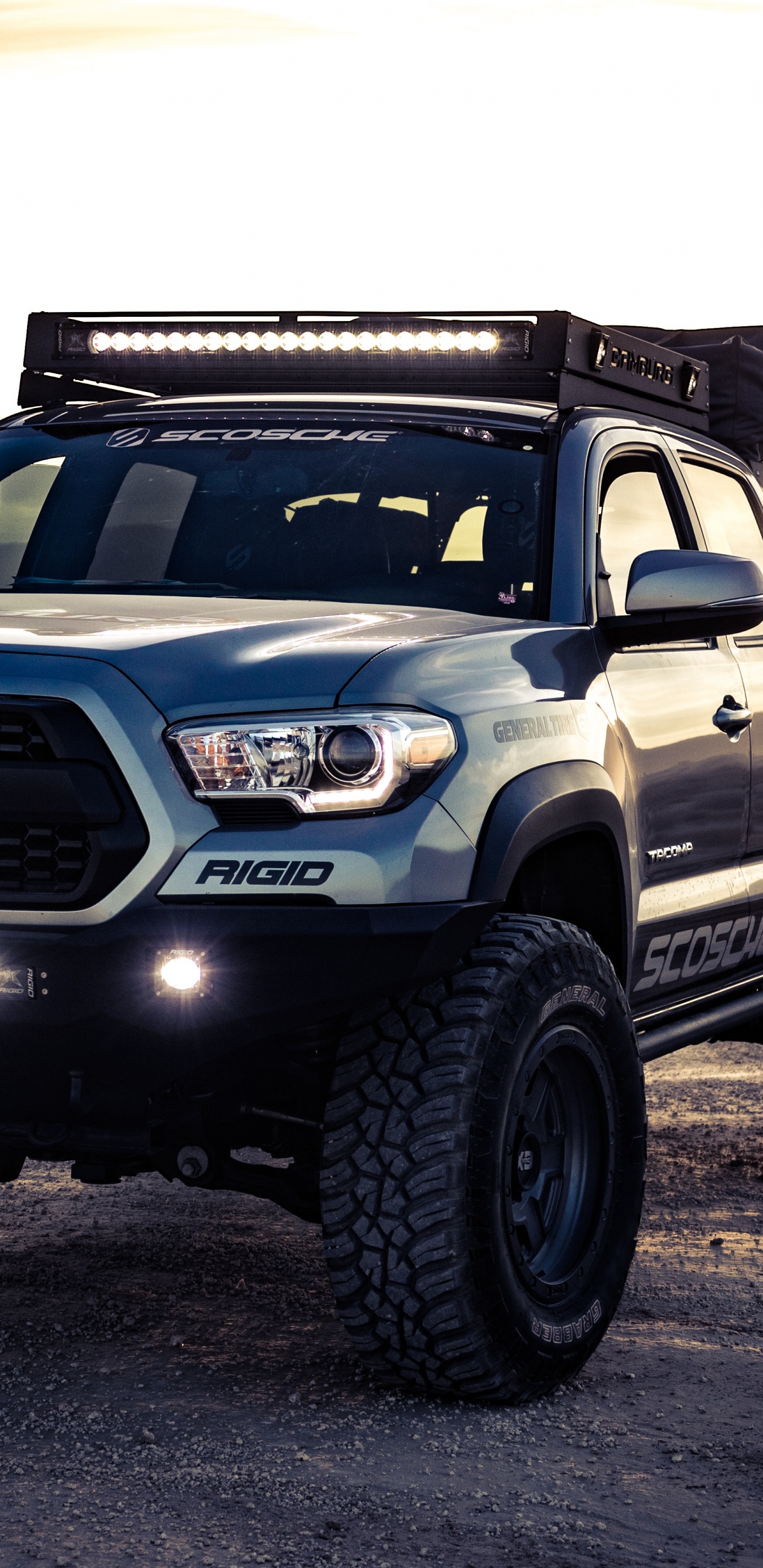 Black and Silver Nissan Suv. Wallpaper in 1440x2960 Resolution