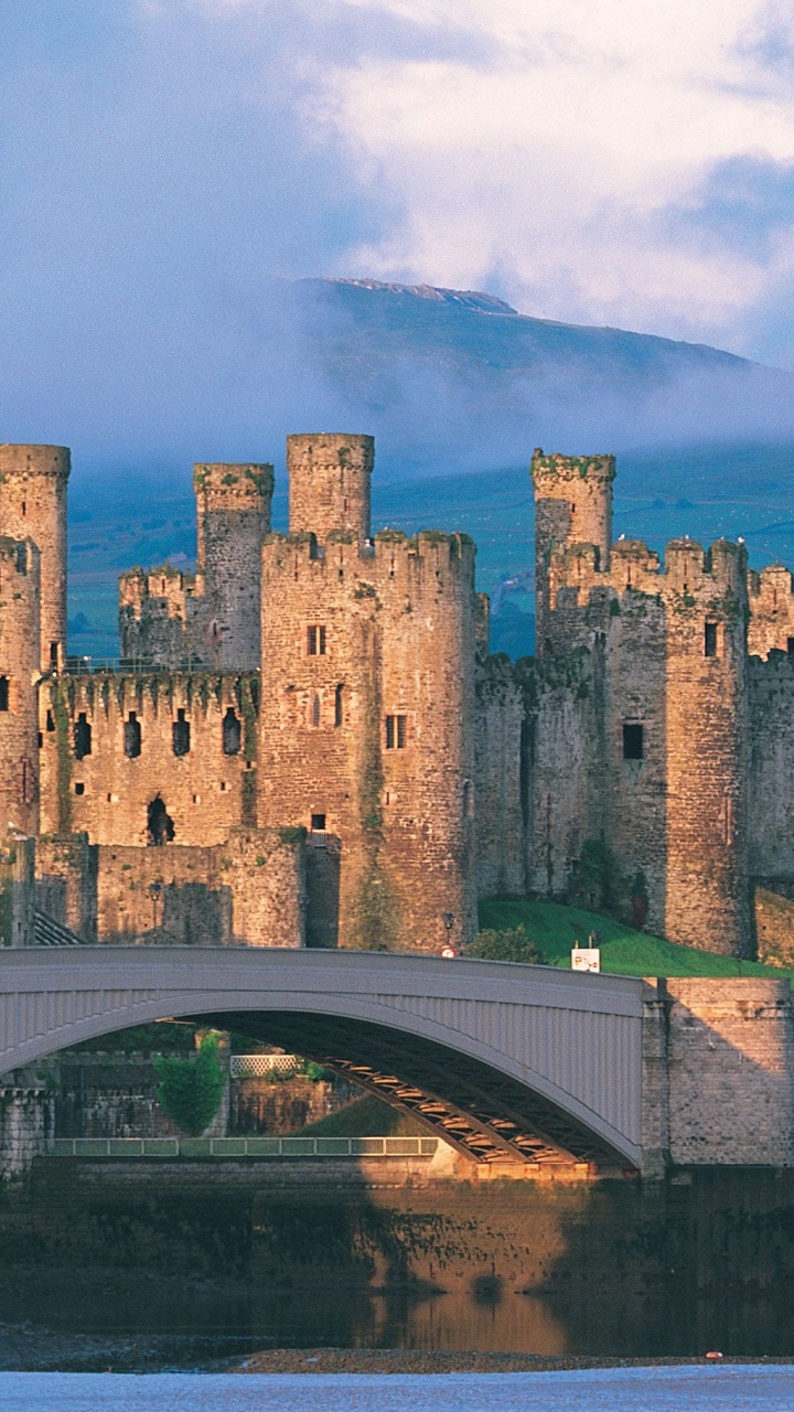 Brown Concrete Castle Under Blue Sky. Wallpaper in 720x1280 Resolution