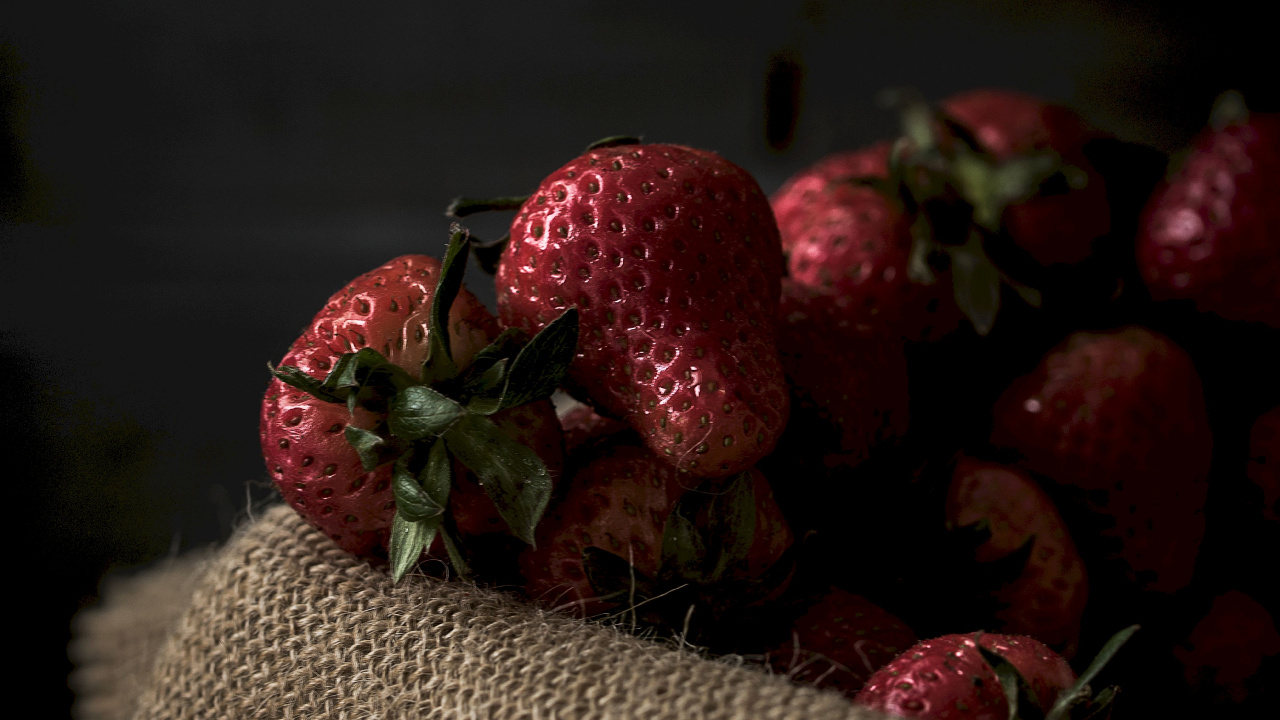 Red Strawberries on Brown Textile. Wallpaper in 1280x720 Resolution