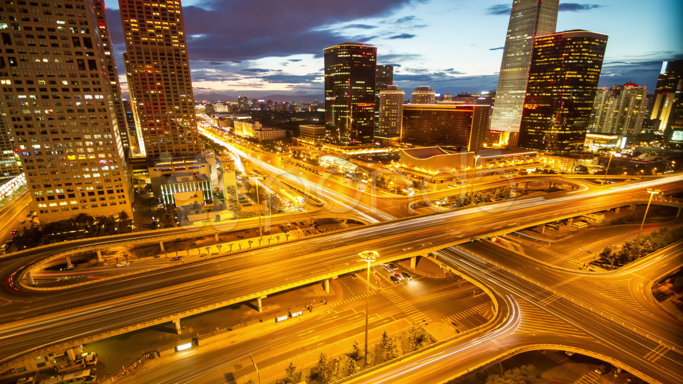 City Buildings Under Blue Sky During Night Time. Wallpaper in 1366x768 Resolution